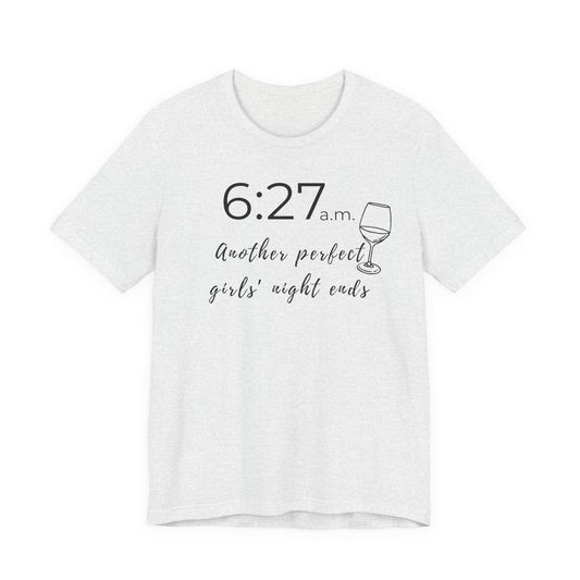 White t-shirt with text and wine glass graphic on a white background