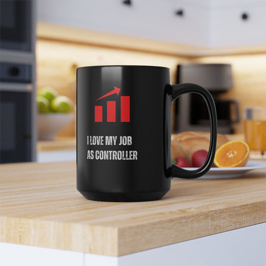 Office Controller Mug Black mug with a red and white graphic and text on a kitchen counter.