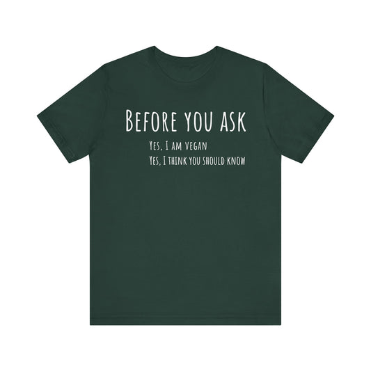 Green t-shirt with white text on a white background