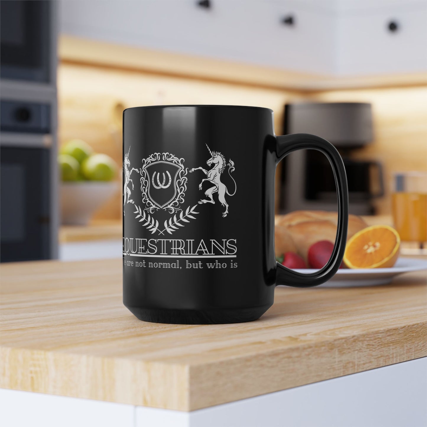 Black mug with unicorn design and text on a kitchen counter