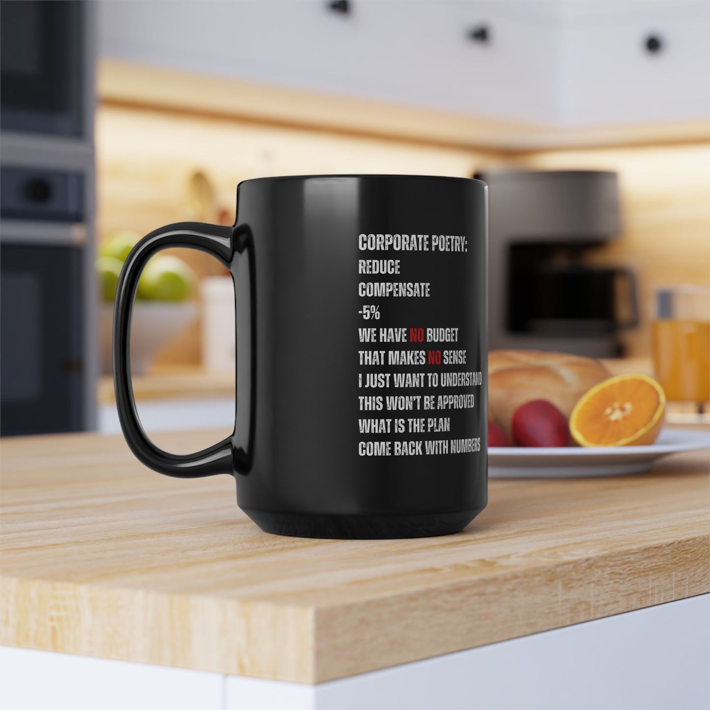 Black mug with text on a kitchen counter