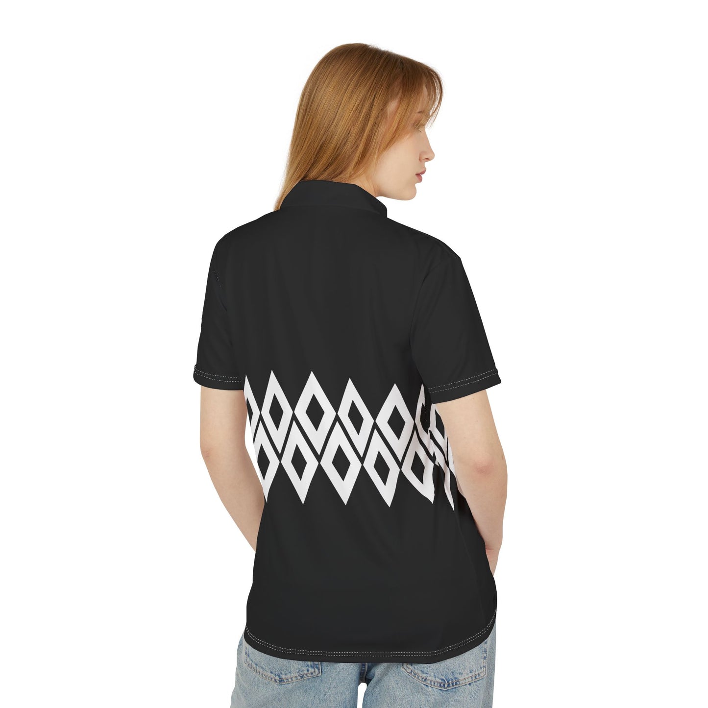 Person wearing a black polo shirt with white geometric pattern on the back, standing against a white background.
