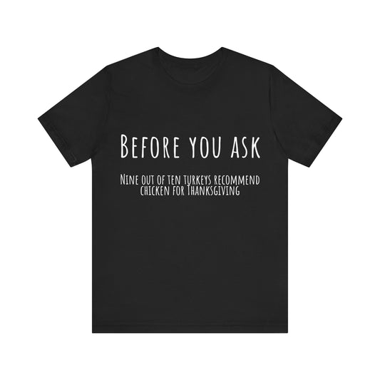 Black t-shirt with white text on a white background