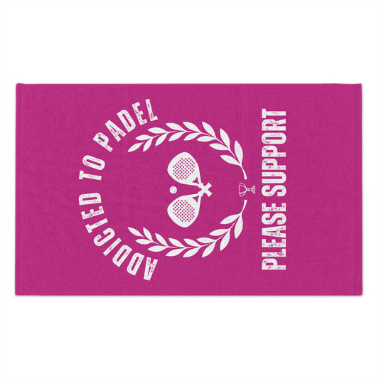 Pink towel with white text and paddle design on a white background