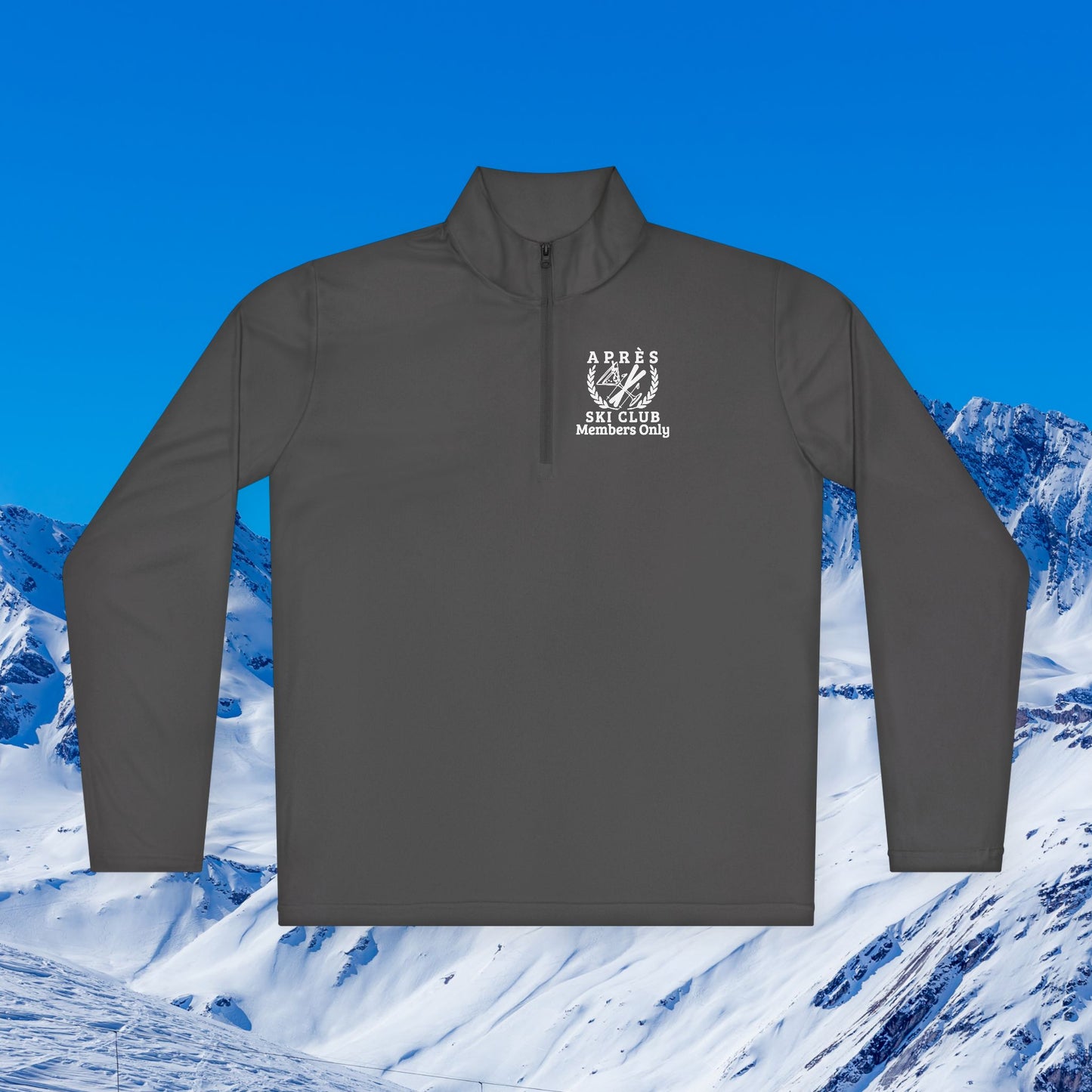 Ski Pullover A dark gray long-sleeve quarter-zip pullover with a white chest graphic reading 'APRÈS ski club members only' and a ski motif, shown against a snowy mountain and blue sky background.