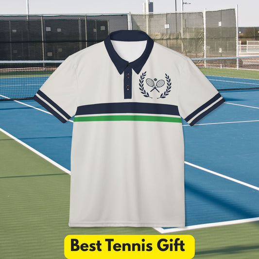 Vintage Tennis Polo Shirt A white short-sleeve polo shirt with a navy blue collar and sleeve trim, featuring a green horizontal stripe across the chest and a navy blue tennis-themed crest on the left chest. The shirt is displayed against a background of a blue and green tennis court with a net and fencing, and a yellow banner at the bottom reads 'Best Tennis Gift'.