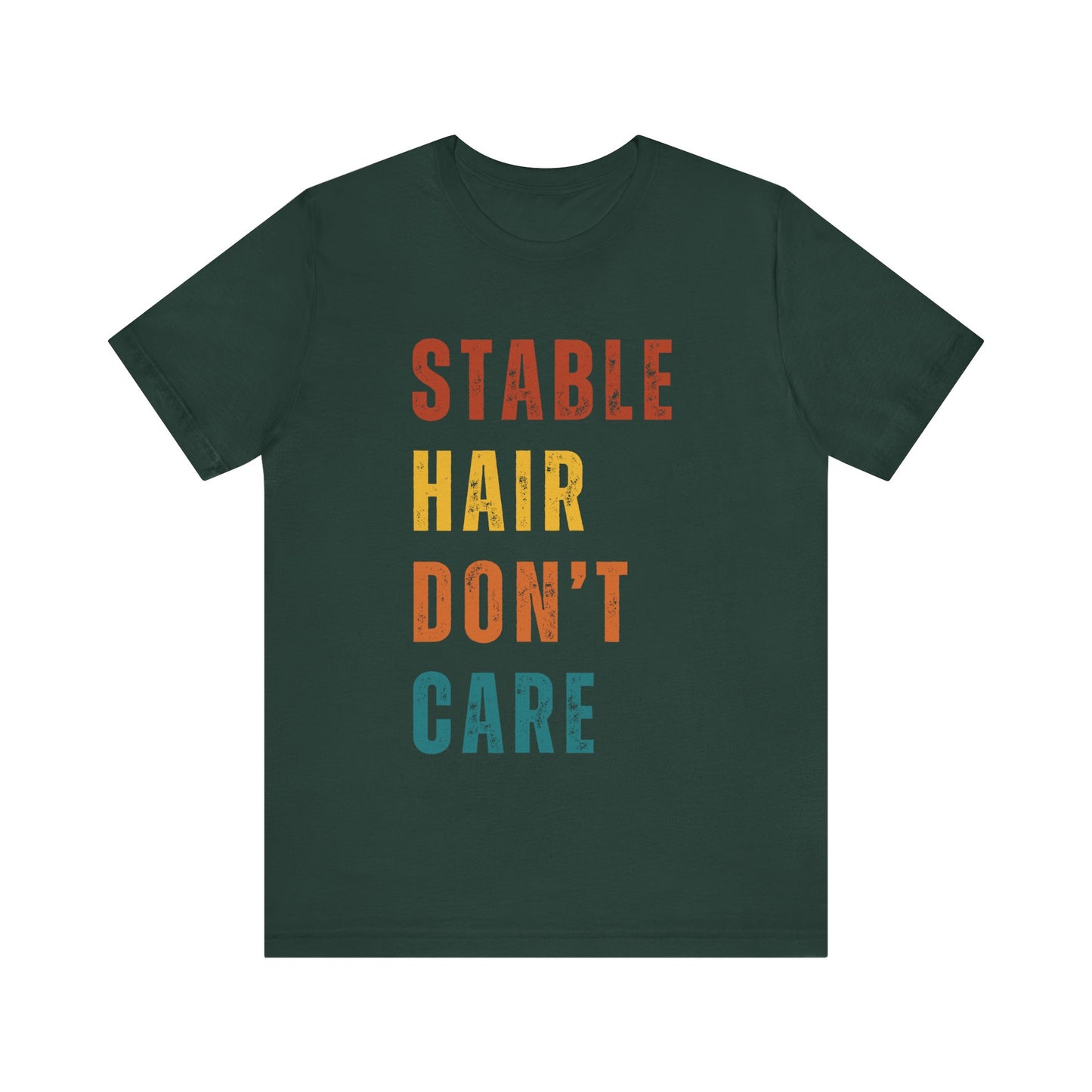 Green t-shirt with colorful text 'STABLE HAIR DON'T CARE' on a white background