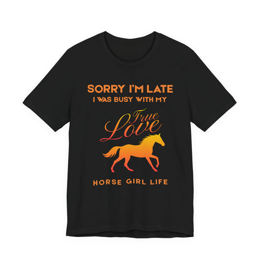 Black t-shirt with orange text and horse graphic on a white background
