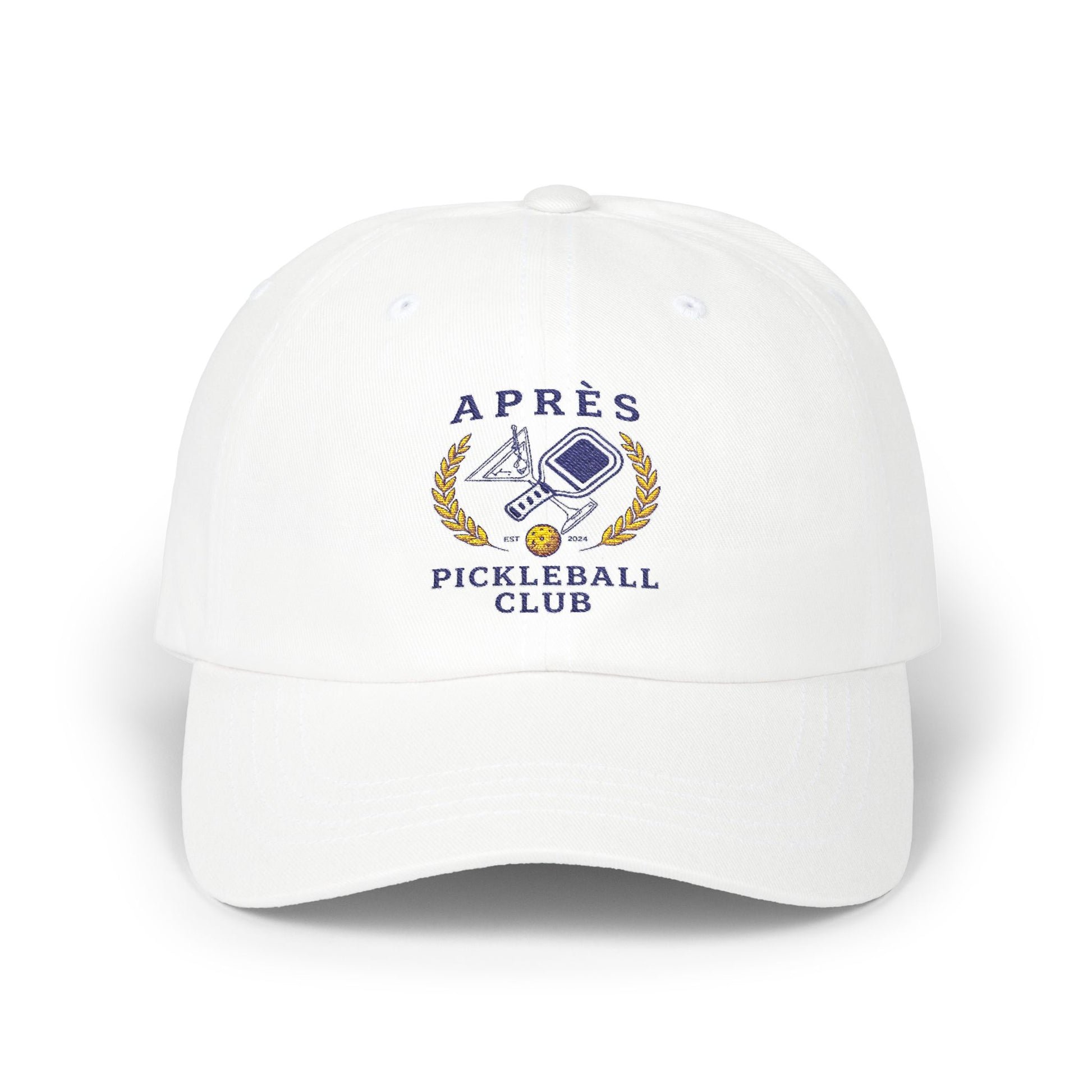 White cap with 'Apres Pickleball Club' logo on a white background