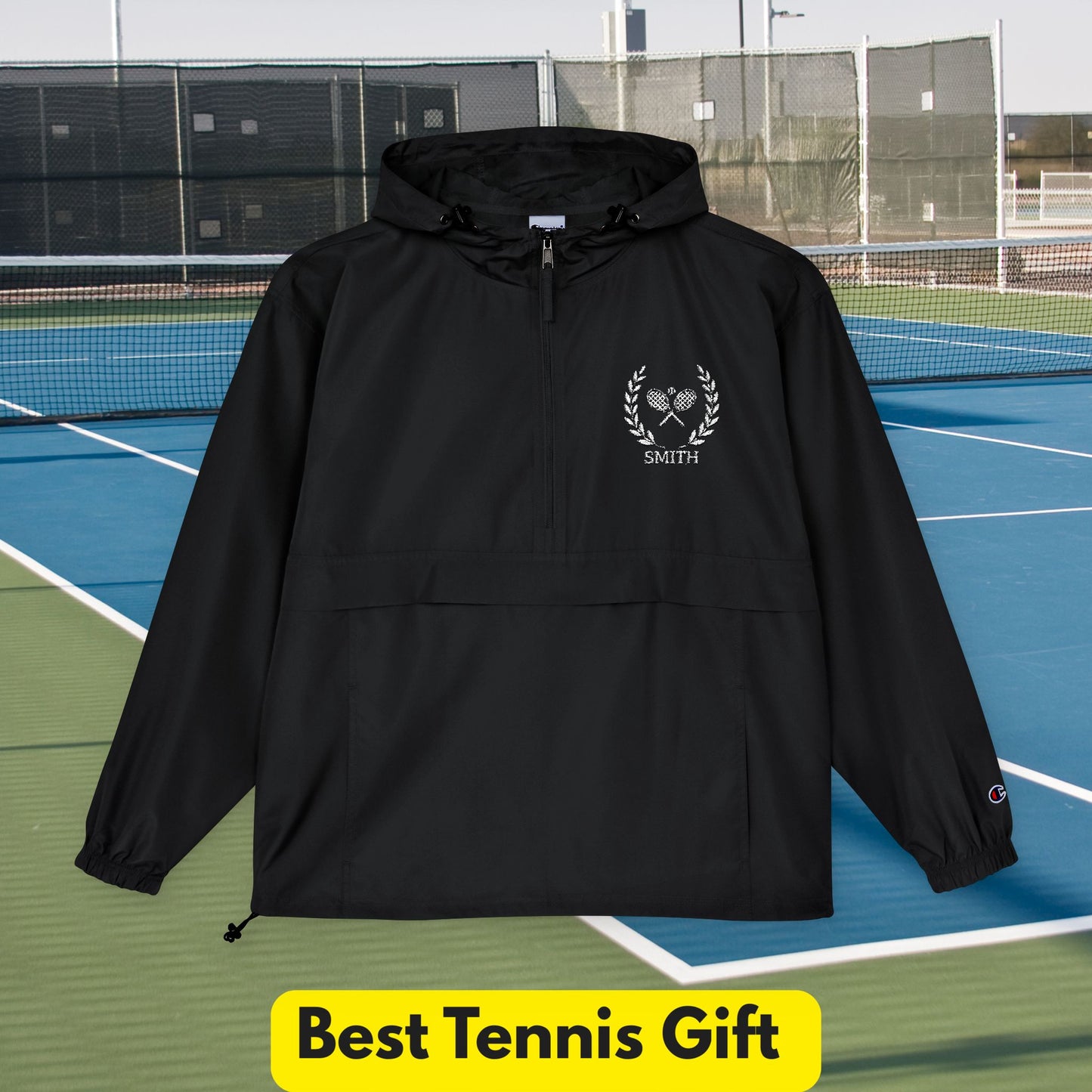 Tennis jacket Black jacket with a logo on a tennis court, labeled 'Best Tennis Gift'.