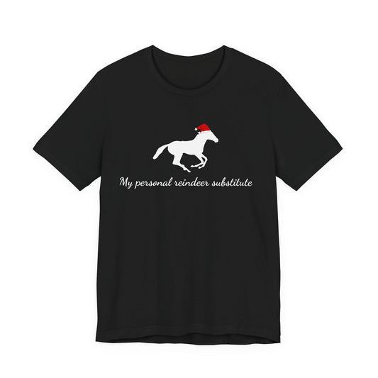 Black t-shirt with a white horse wearing a red Santa hat and text 'My personal reindeer substitute' on a white background.