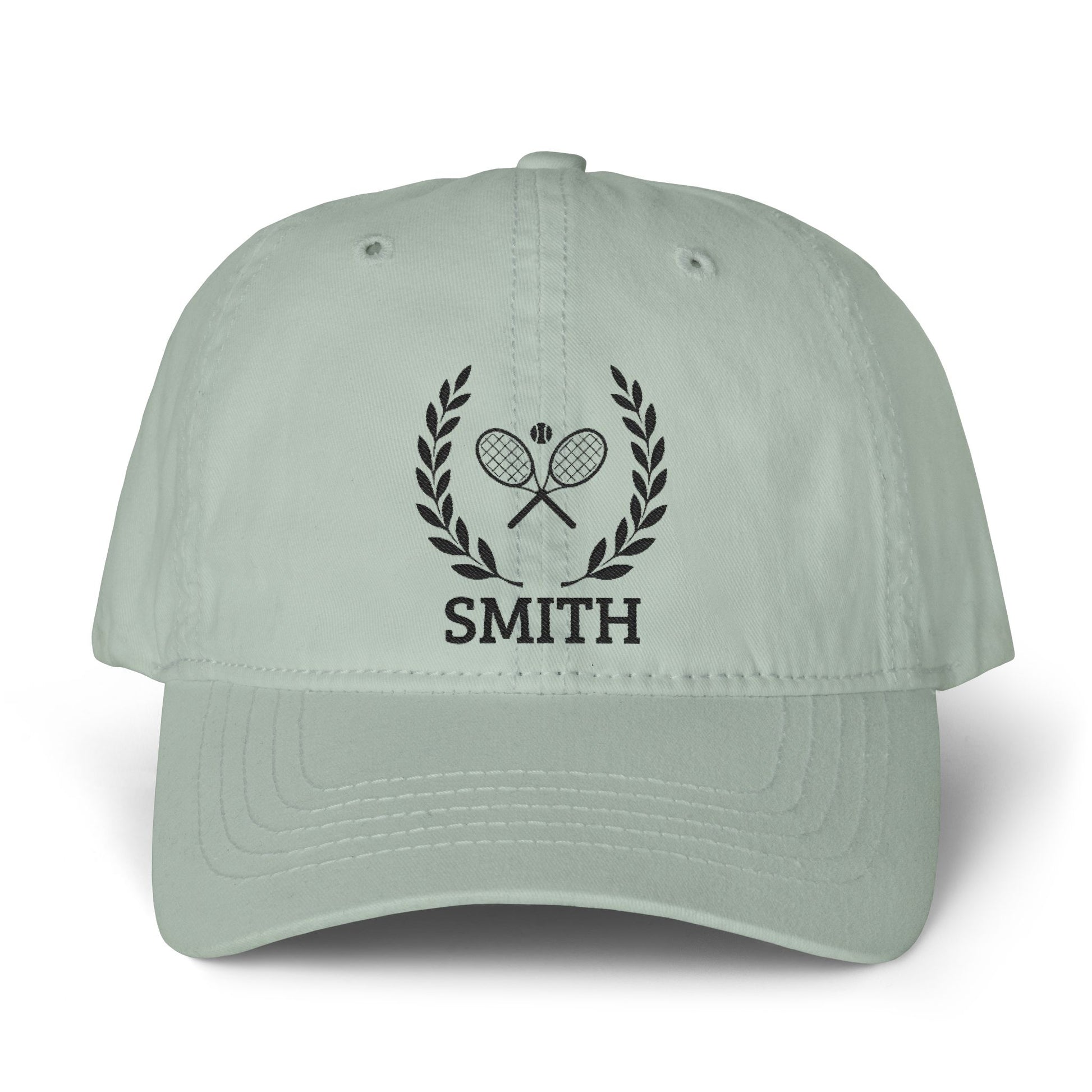 Tennis cap for women Light green cap with black logo and text on a white background