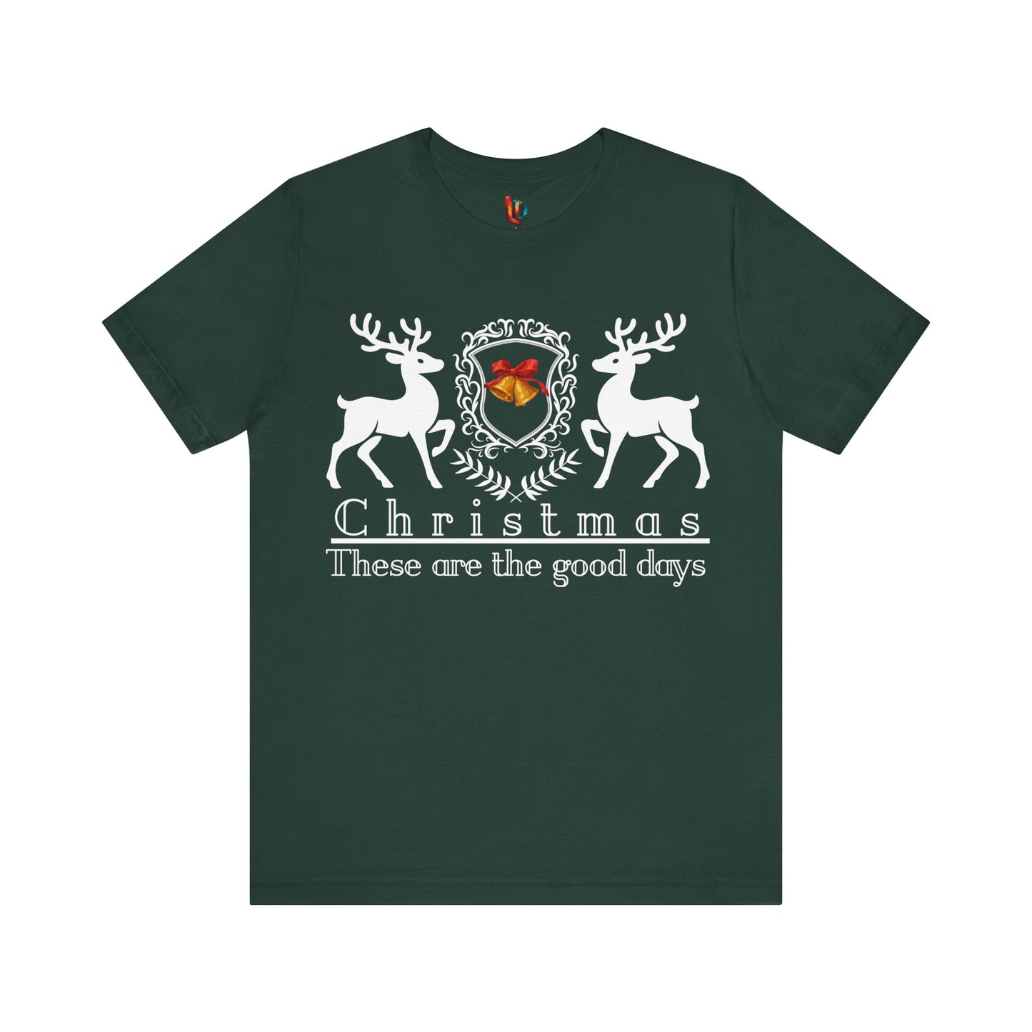 Green t-shirt with Christmas design featuring two deer and a crest on a white background