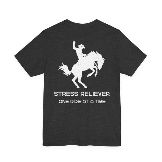 Black t-shirt with white graphic of a person riding a horse and text 'STRESS RELIEVER ONE RIDE AT A TIME' on a white background.