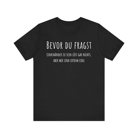 Black t-shirt with white text on a white background