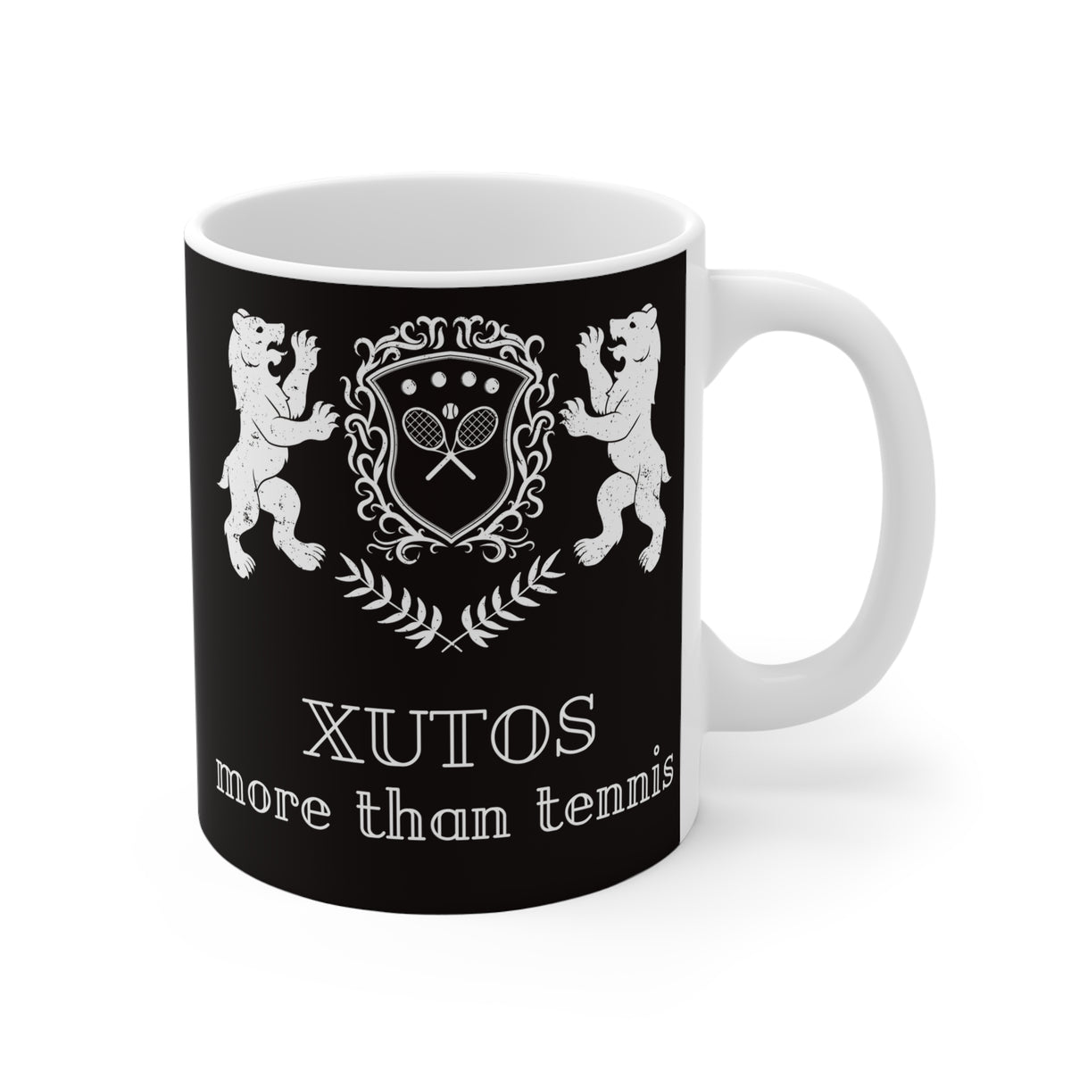 A white ceramic mug with a black printed wrap design featuring two white bears, a tennis racket crest, and the text 'XUTOS more than tennis' on a white background.