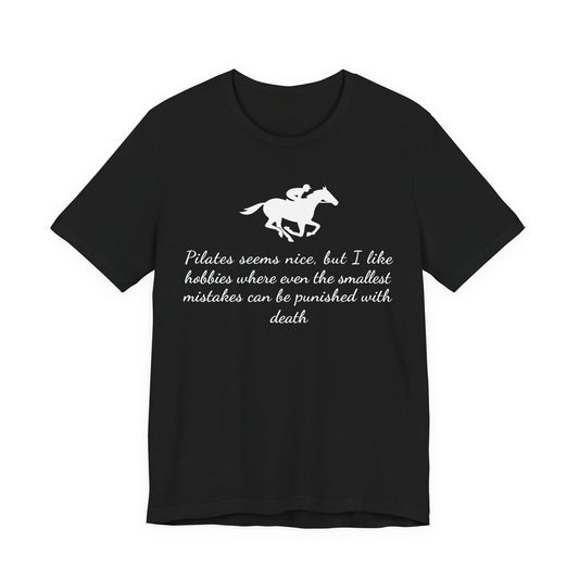 Black t-shirt with white horse graphic and text on a white background