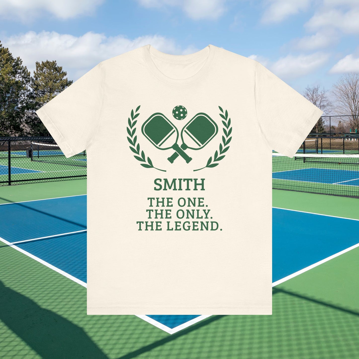 Funny pickleball shirt A white short-sleeve t-shirt with a green tennis-themed graphic and text reading 'SMITH THE ONE. THE ONLY.
