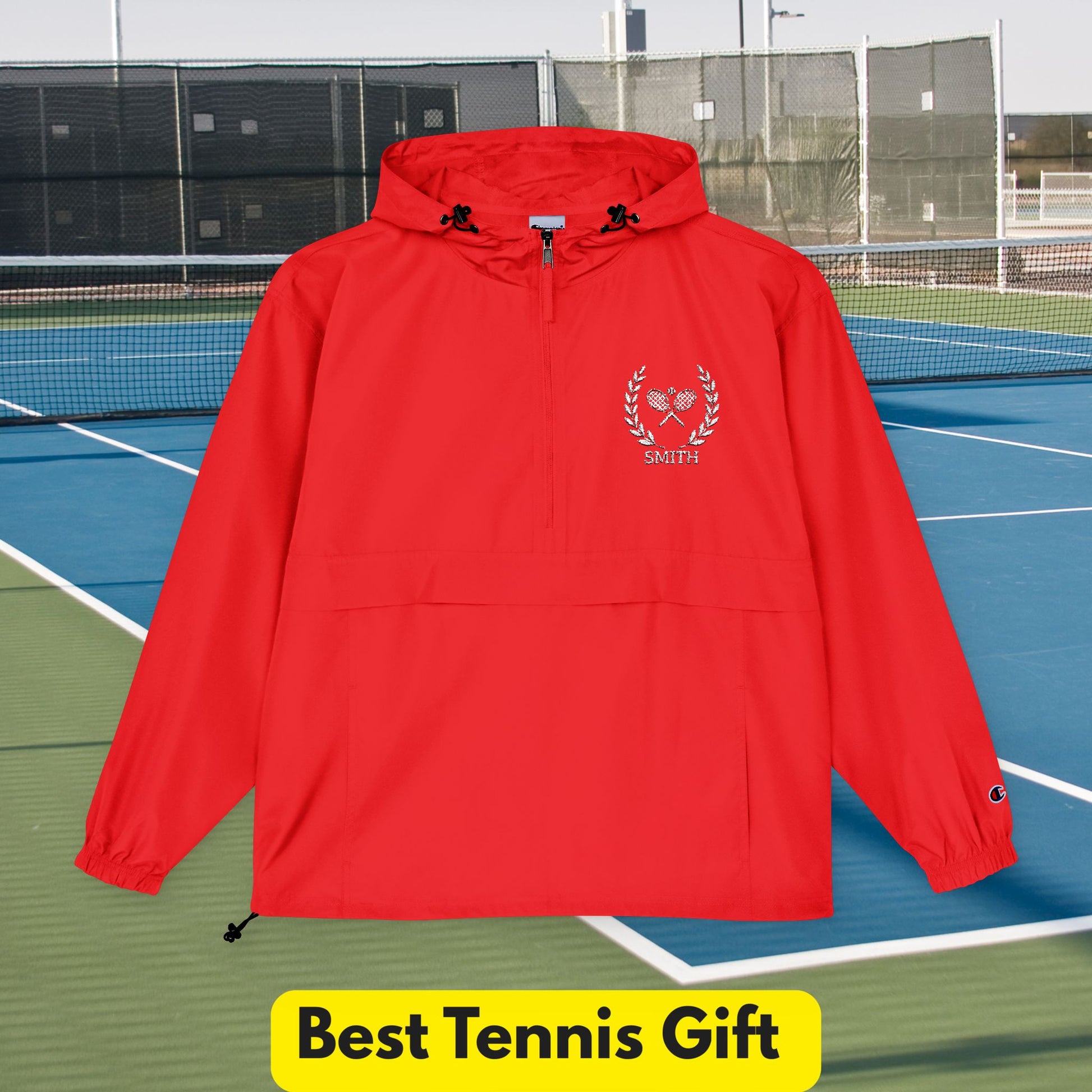 Tennis jacket Red hooded jacket with a logo on a tennis court, labeled 'Best Tennis Gift'.