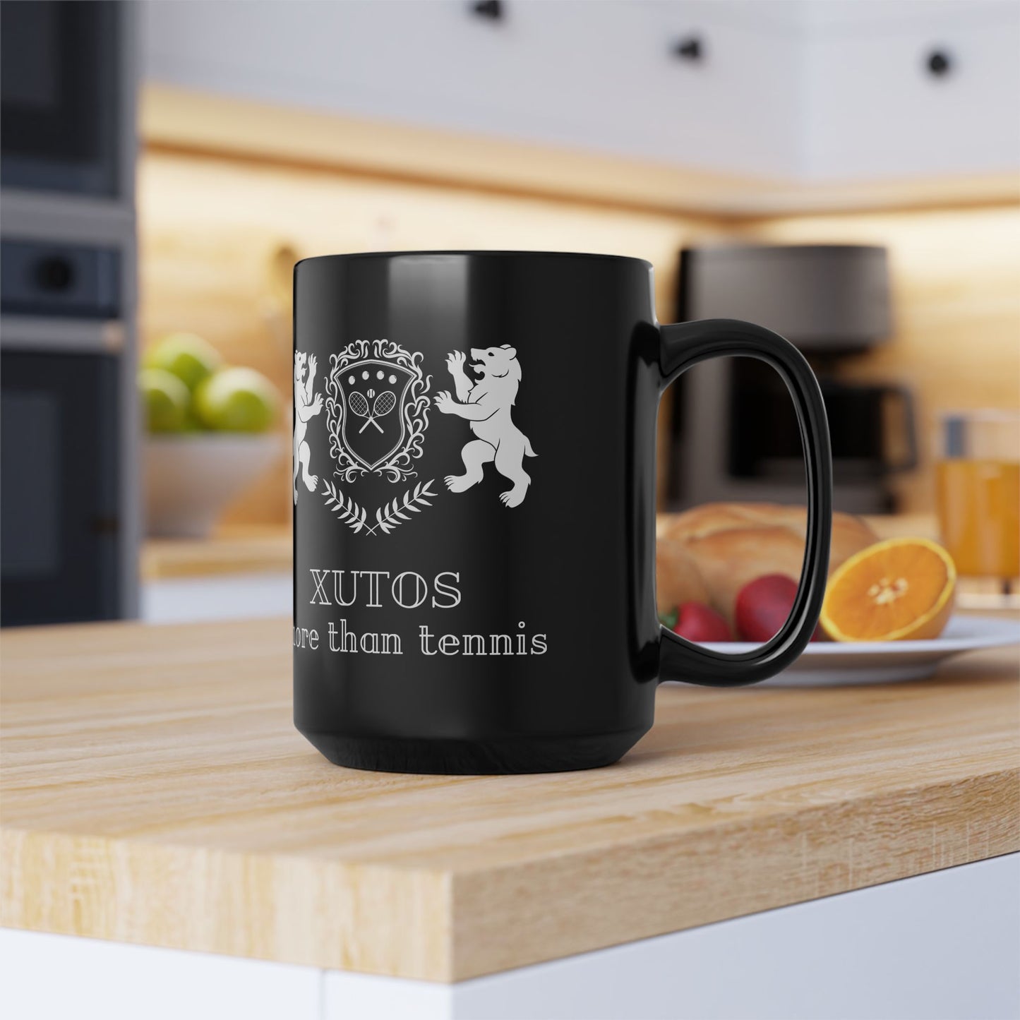 Black XUTOS mug with white design and text on a kitchen counter