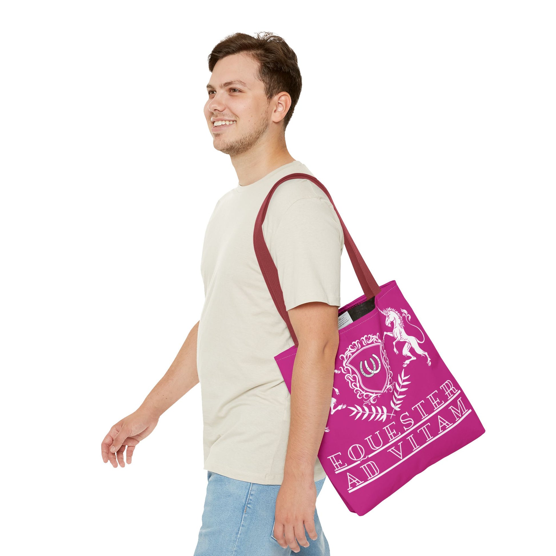 Man carrying a pink tote bag with a logo and text on a white background