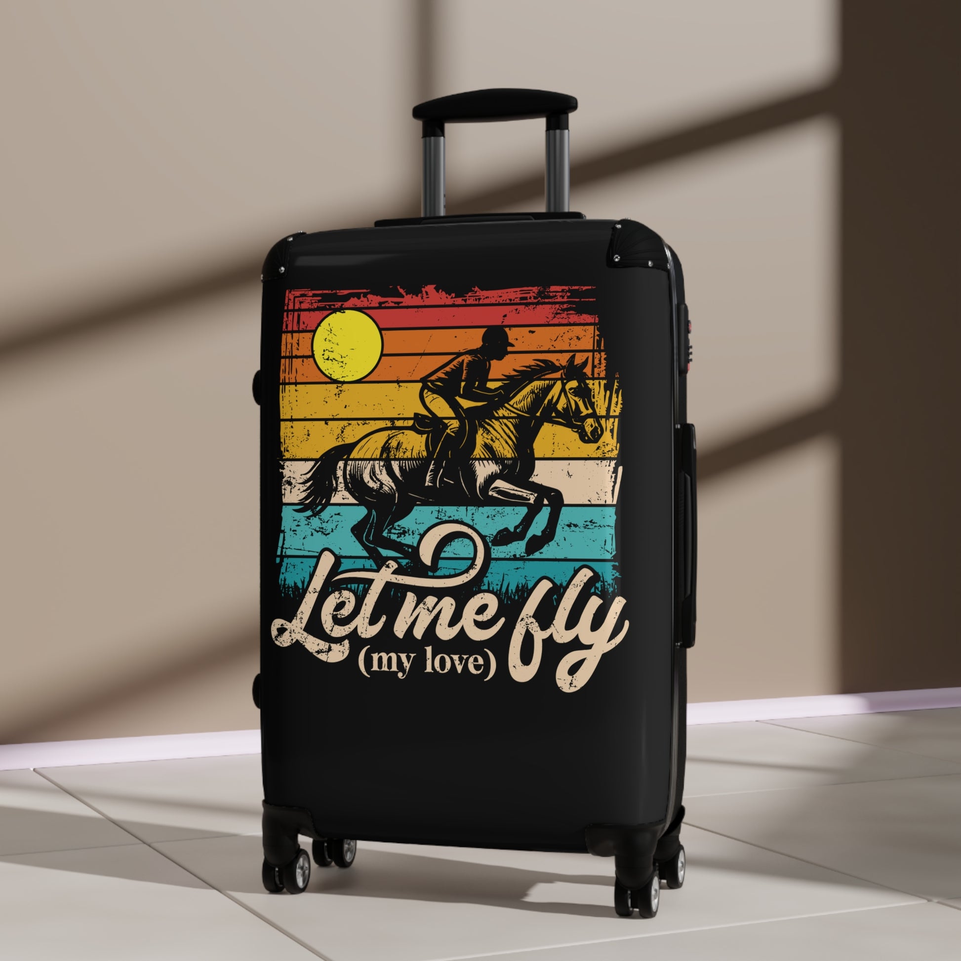 Black suitcase with a colorful graphic and text on a neutral background