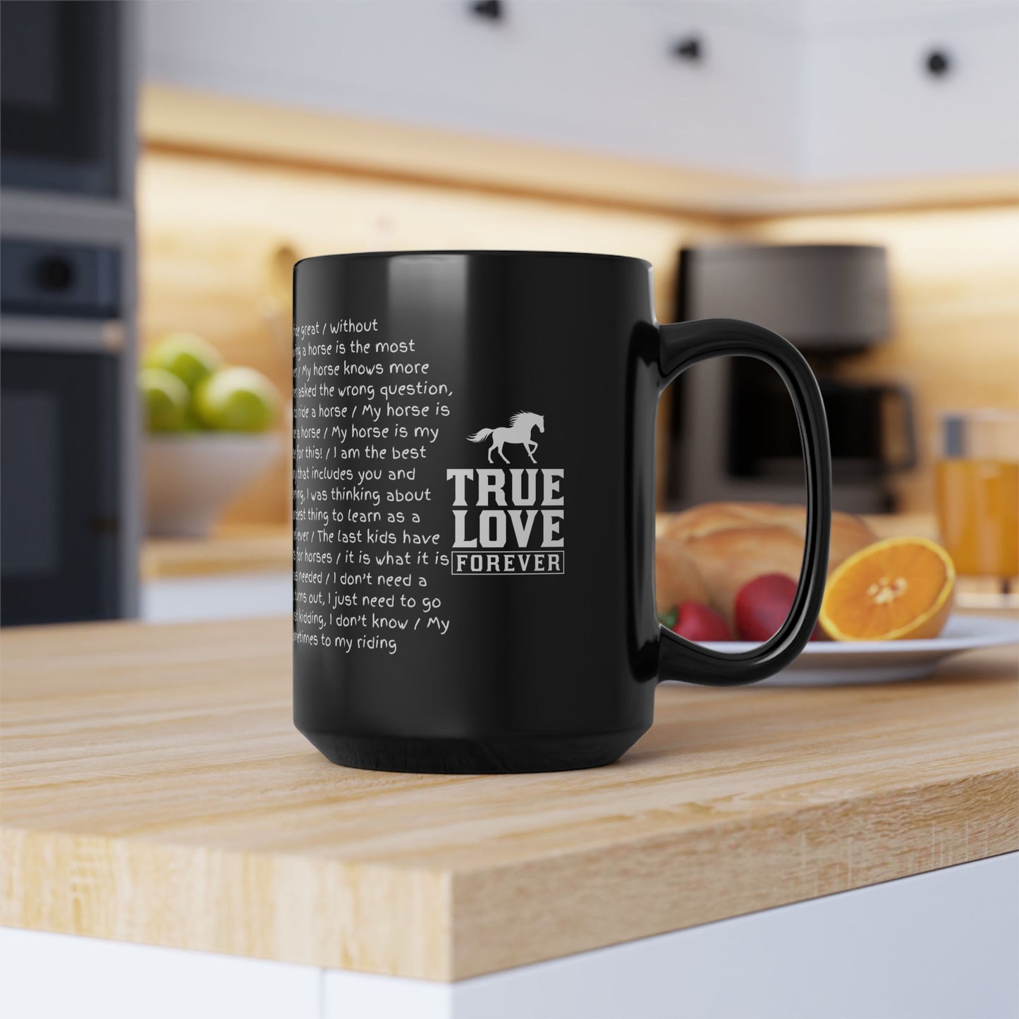 Black mug with text and horse graphic on a kitchen counter