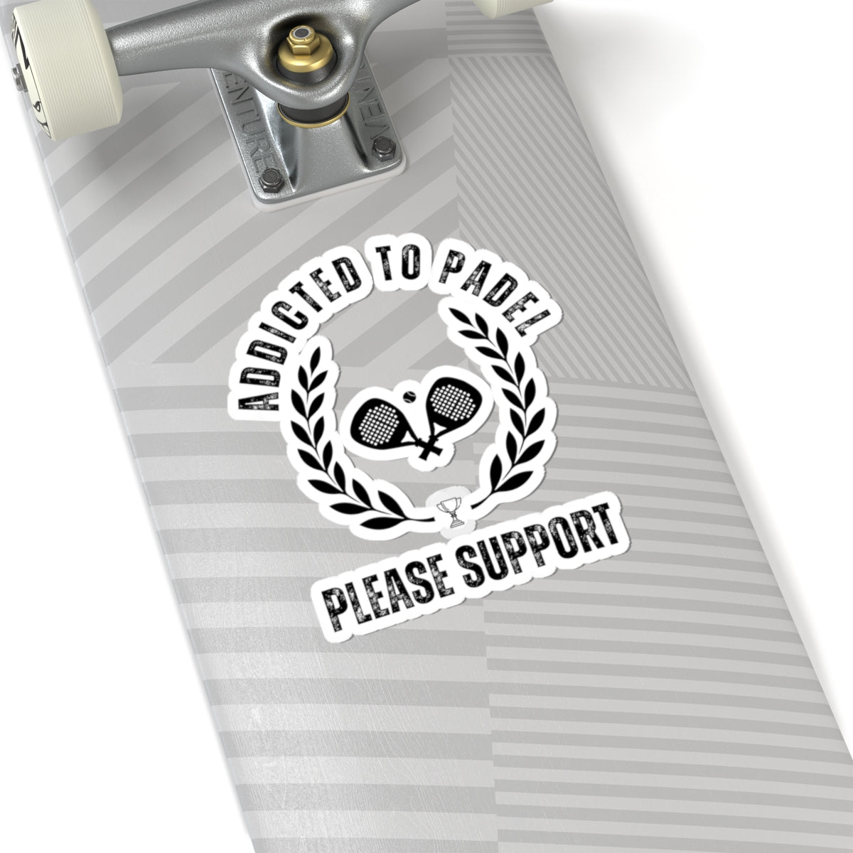 Skateboard deck with a sticker that reads 'Addicted to Padel Please Support' on a white background