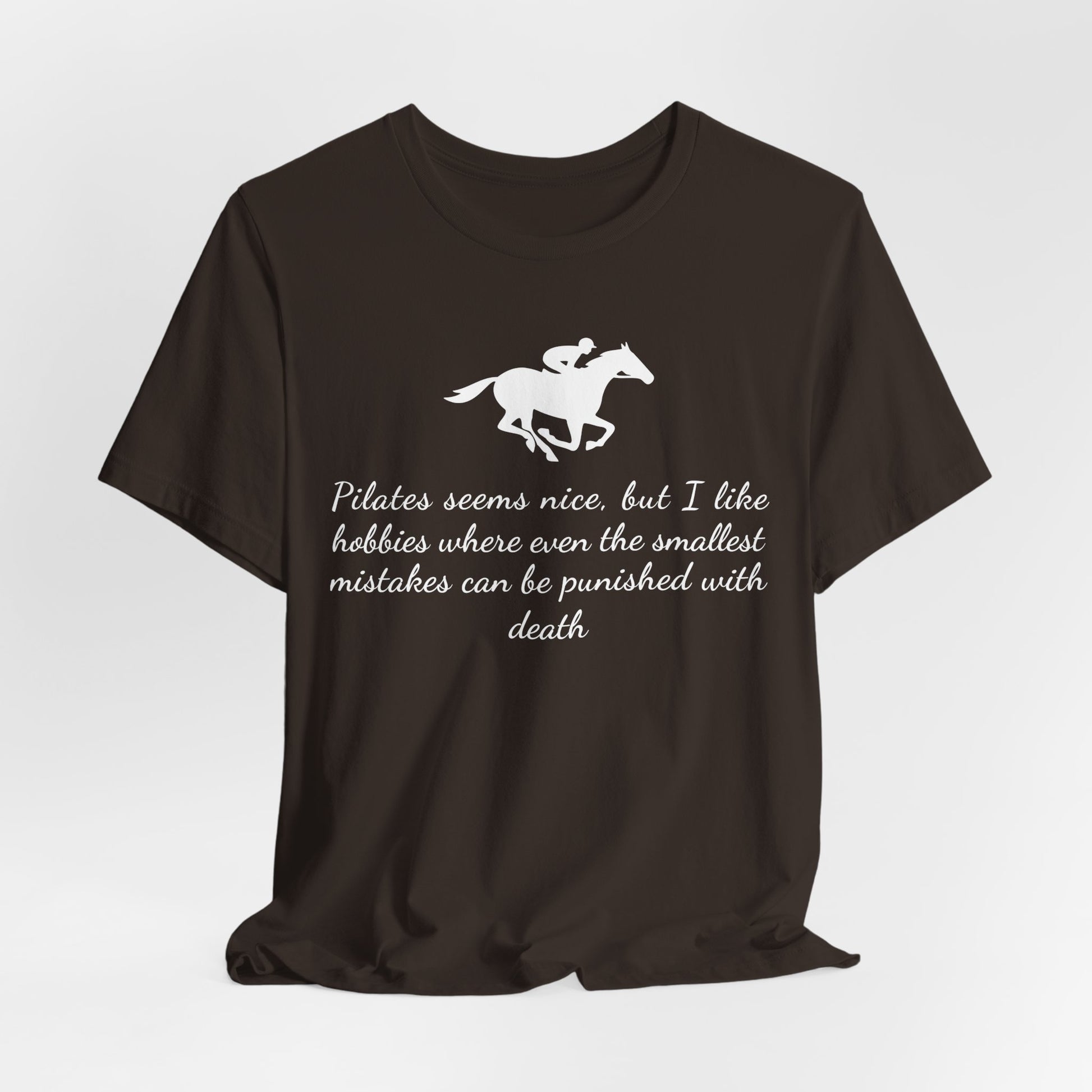 Black t-shirt with white horse graphic and text on a light gray background