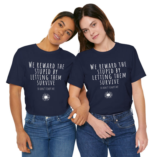 Two people wearing black t-shirts with 'Protect The Dolls' text and red cherries.