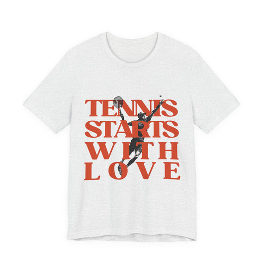 White t-shirt with red text 'Tennis Starts With Love' and a graphic of a tennis player on a white background