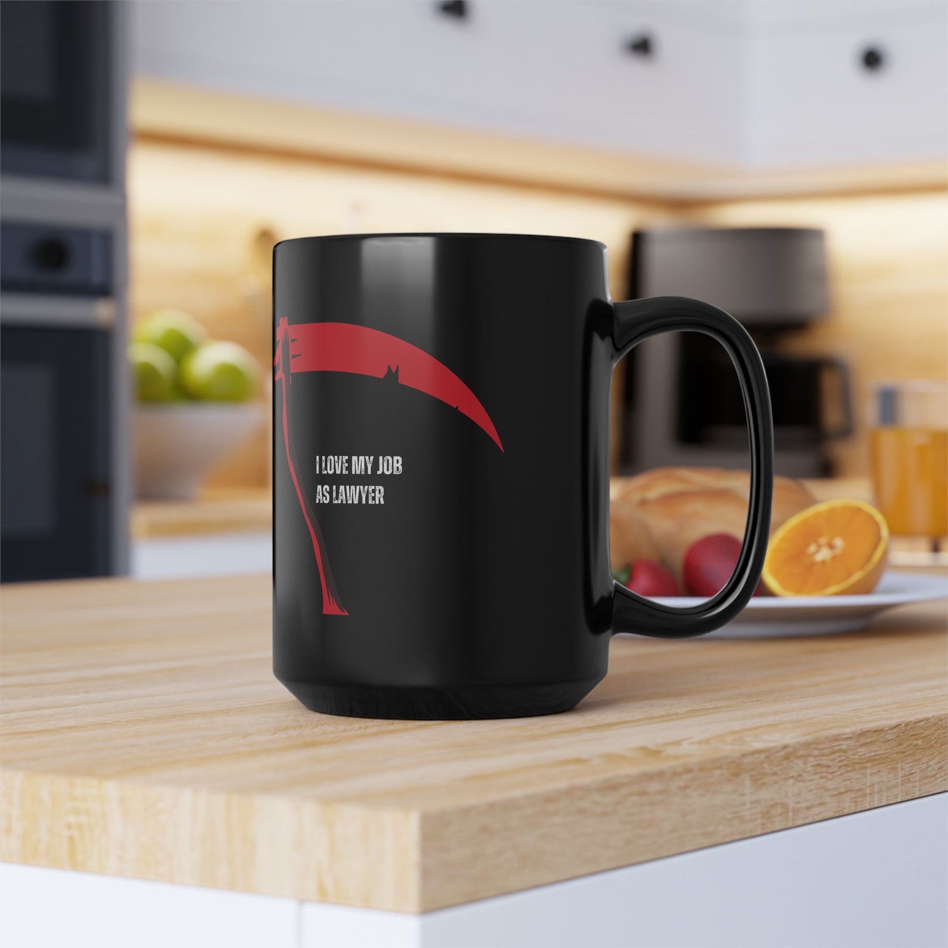 Black mug with a red design and text on a kitchen counter