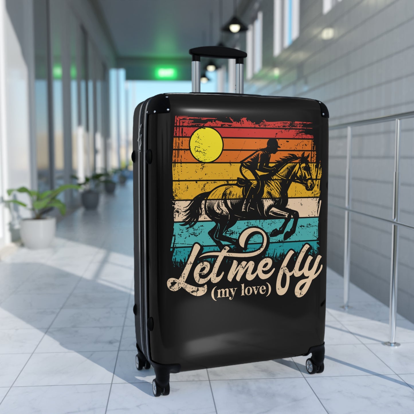 Black suitcase with a colorful design and text in an indoor setting
