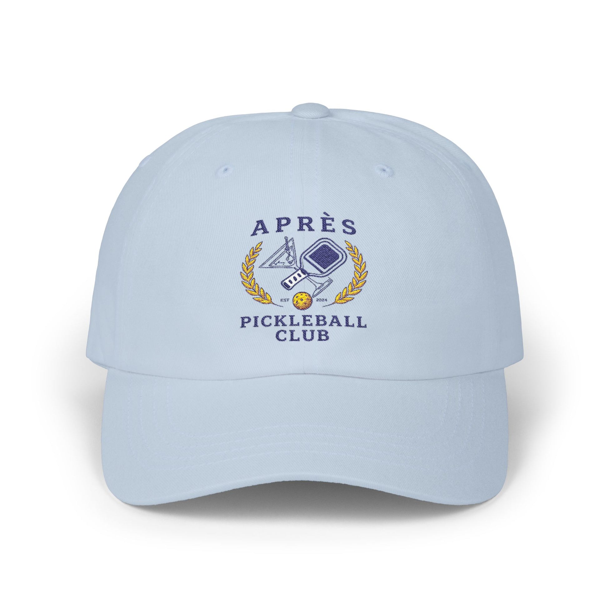 Light blue cap with 'Apres Pickleball Club' logo on a white background