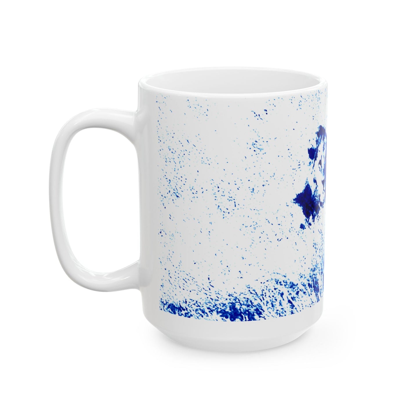 White mug with blue speckled pattern on a white background