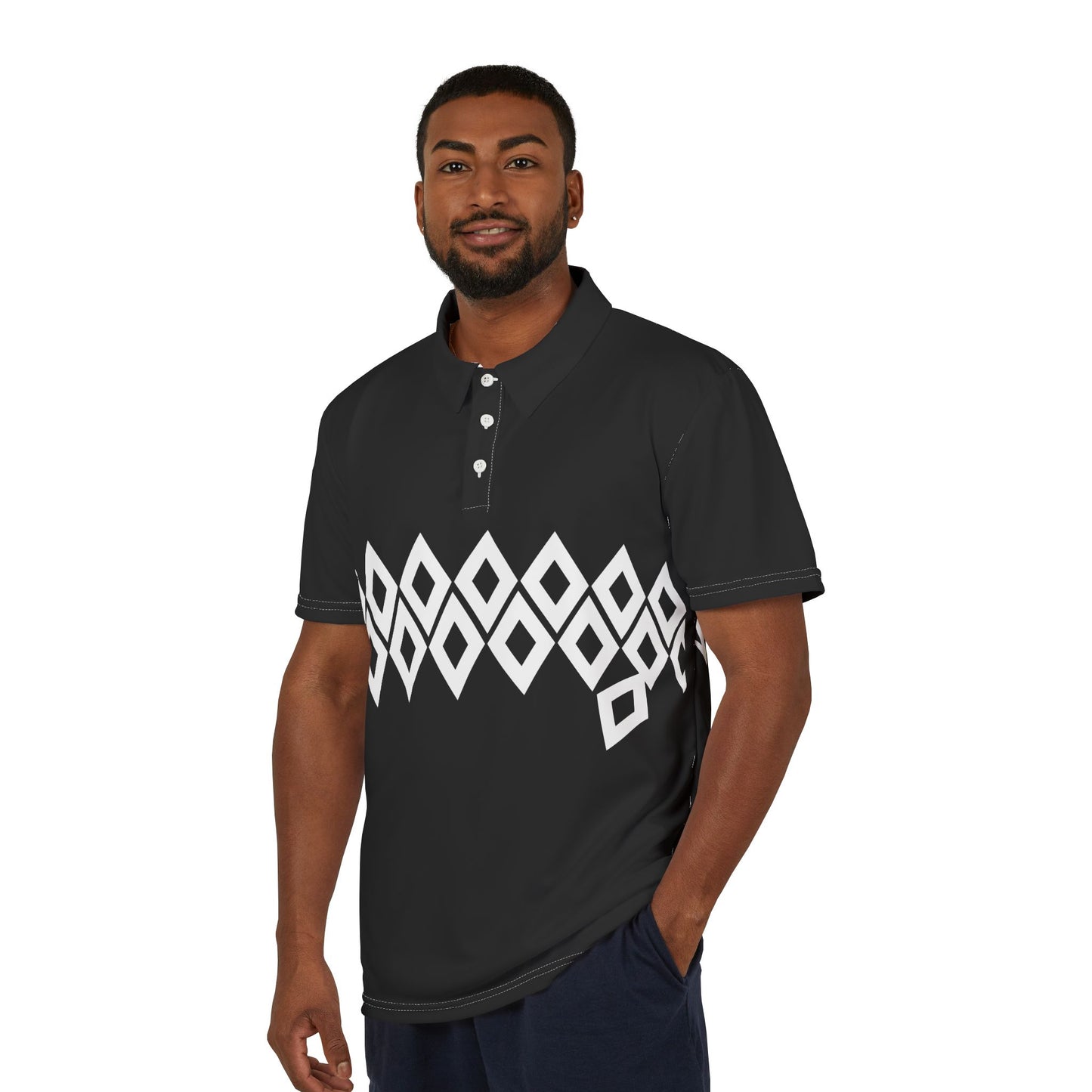 Man wearing a black polo shirt with a white geometric pattern on a white background