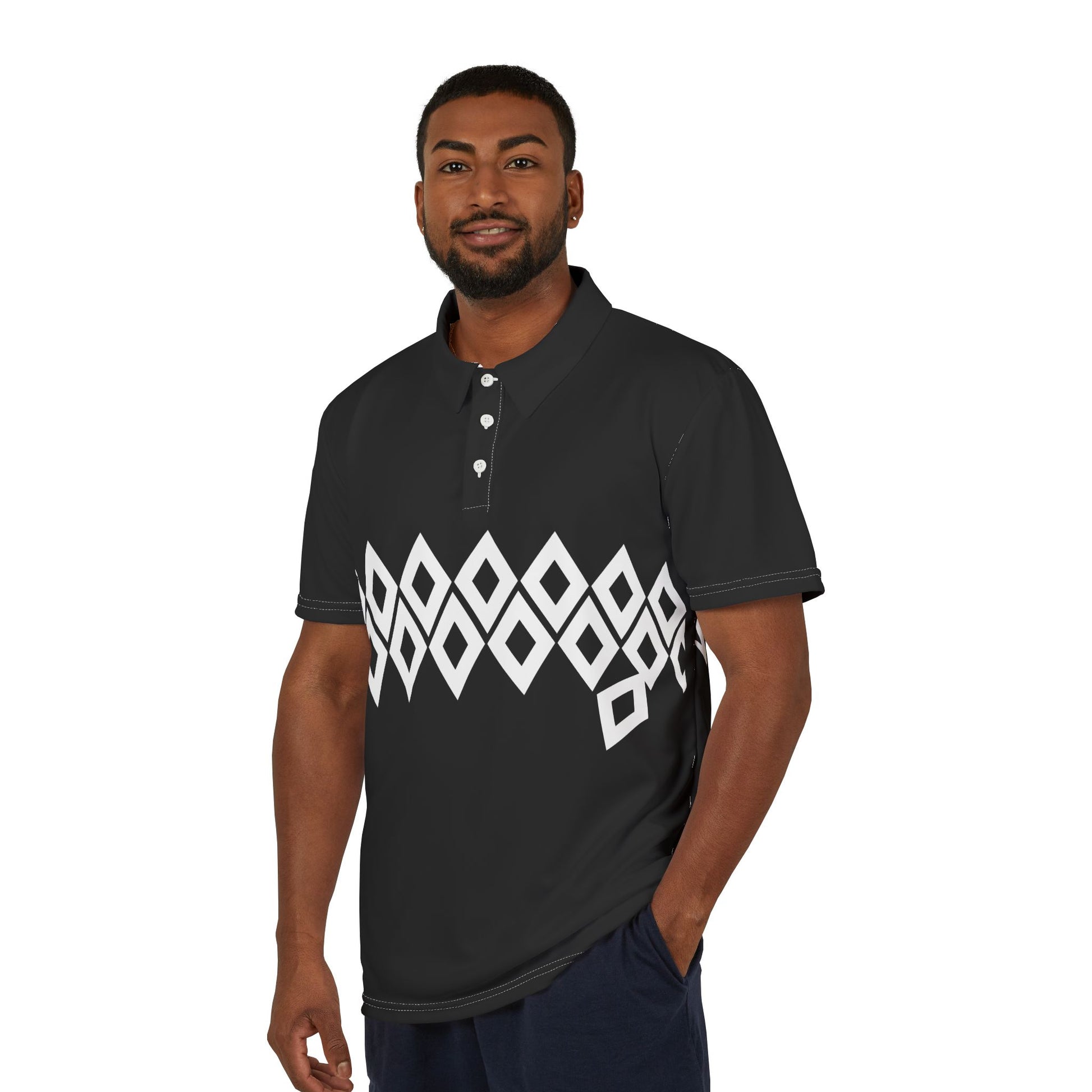 Man wearing a black polo shirt with a white geometric pattern on a white background