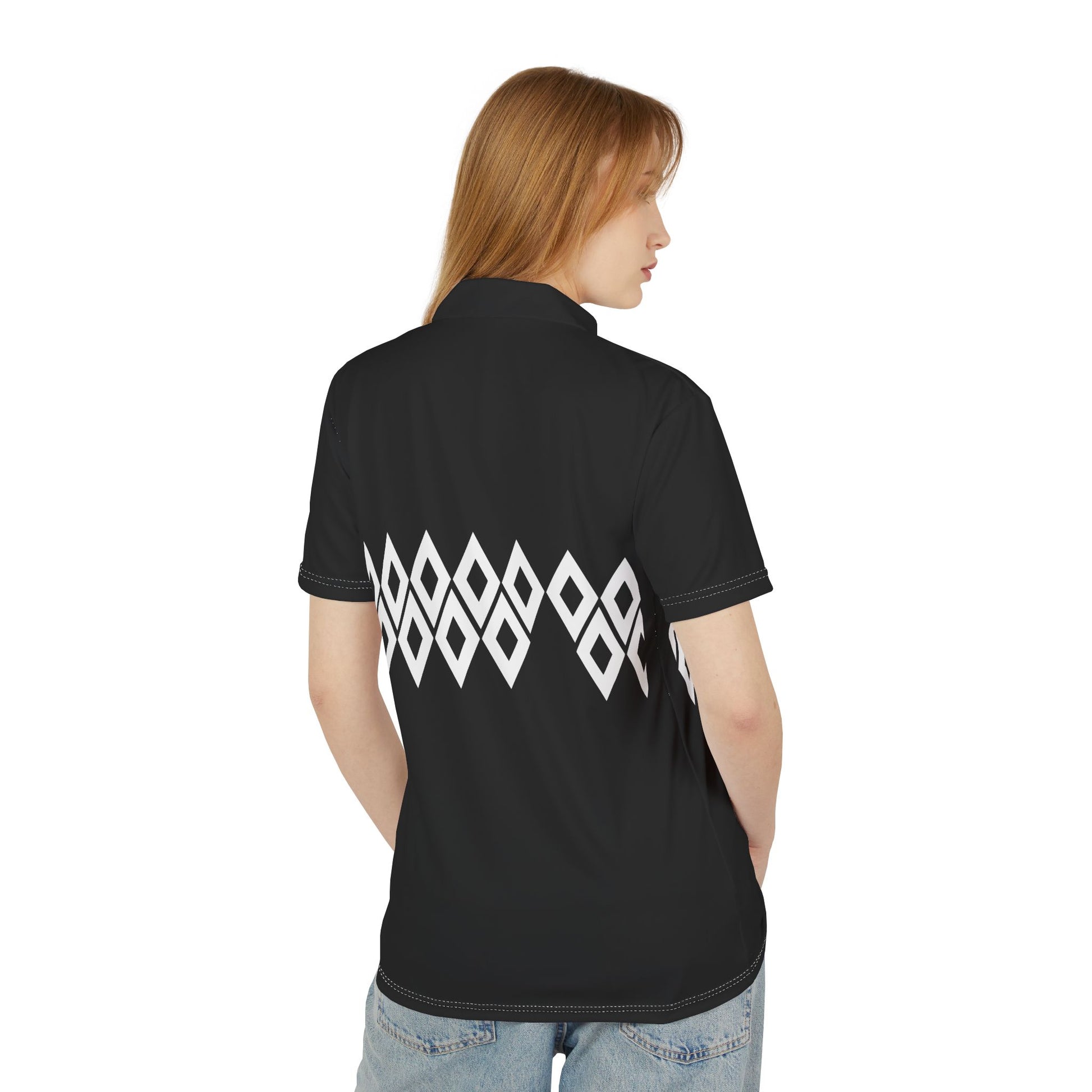 Person wearing a black polo shirt with a white geometric pattern on the back, standing against a white background.