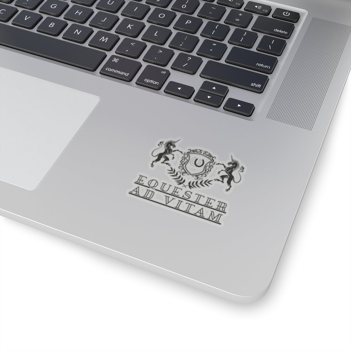 Laptop with 'Equester Ad Vitam' logo on the palm rest area