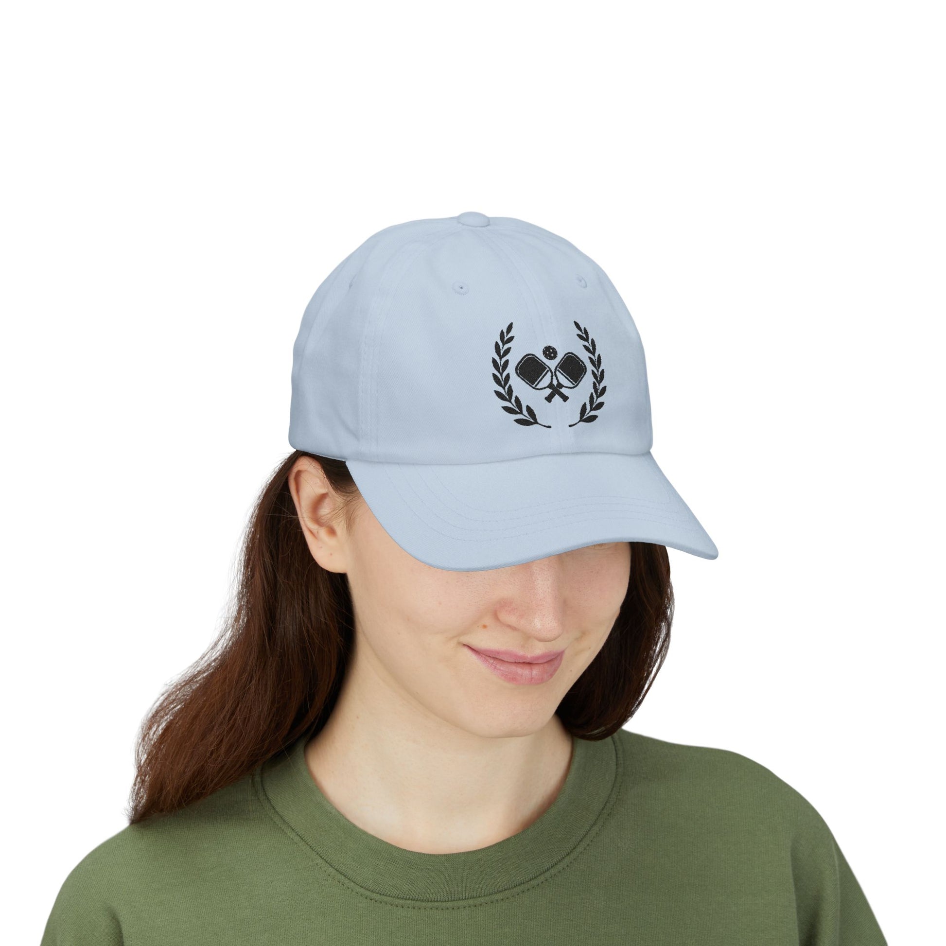 Pickleball  hats Person wearing a light blue cap with 'Based' text on a white background