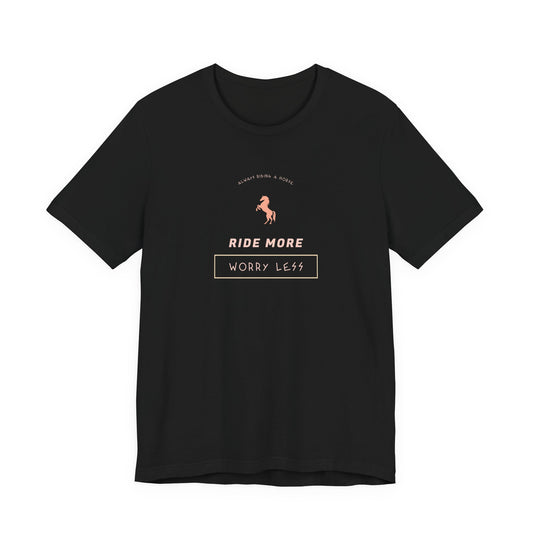 Black t-shirt with horse graphic and text 'Ride More Worry Less' on a white background
