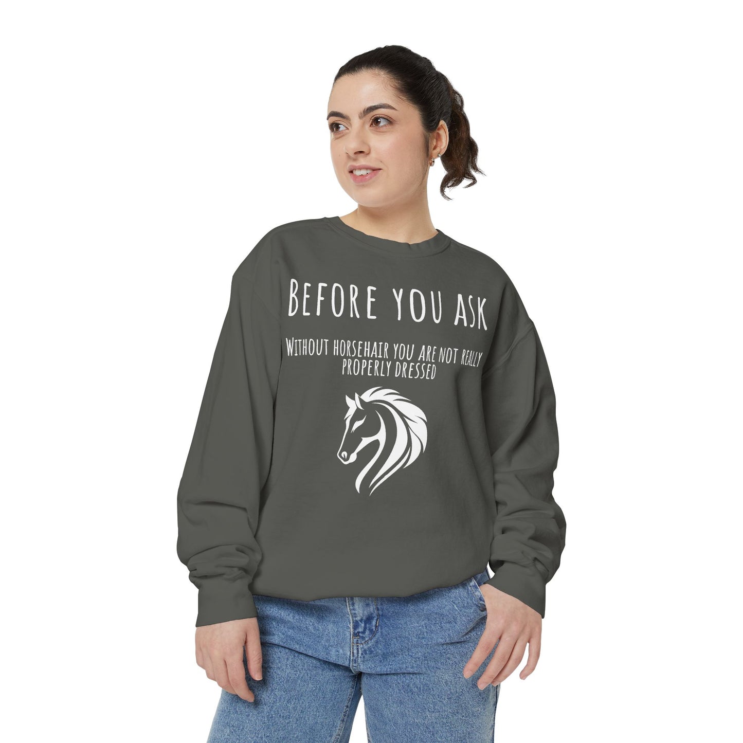 Woman wearing a gray sweatshirt with horse-related text and graphic on a white background