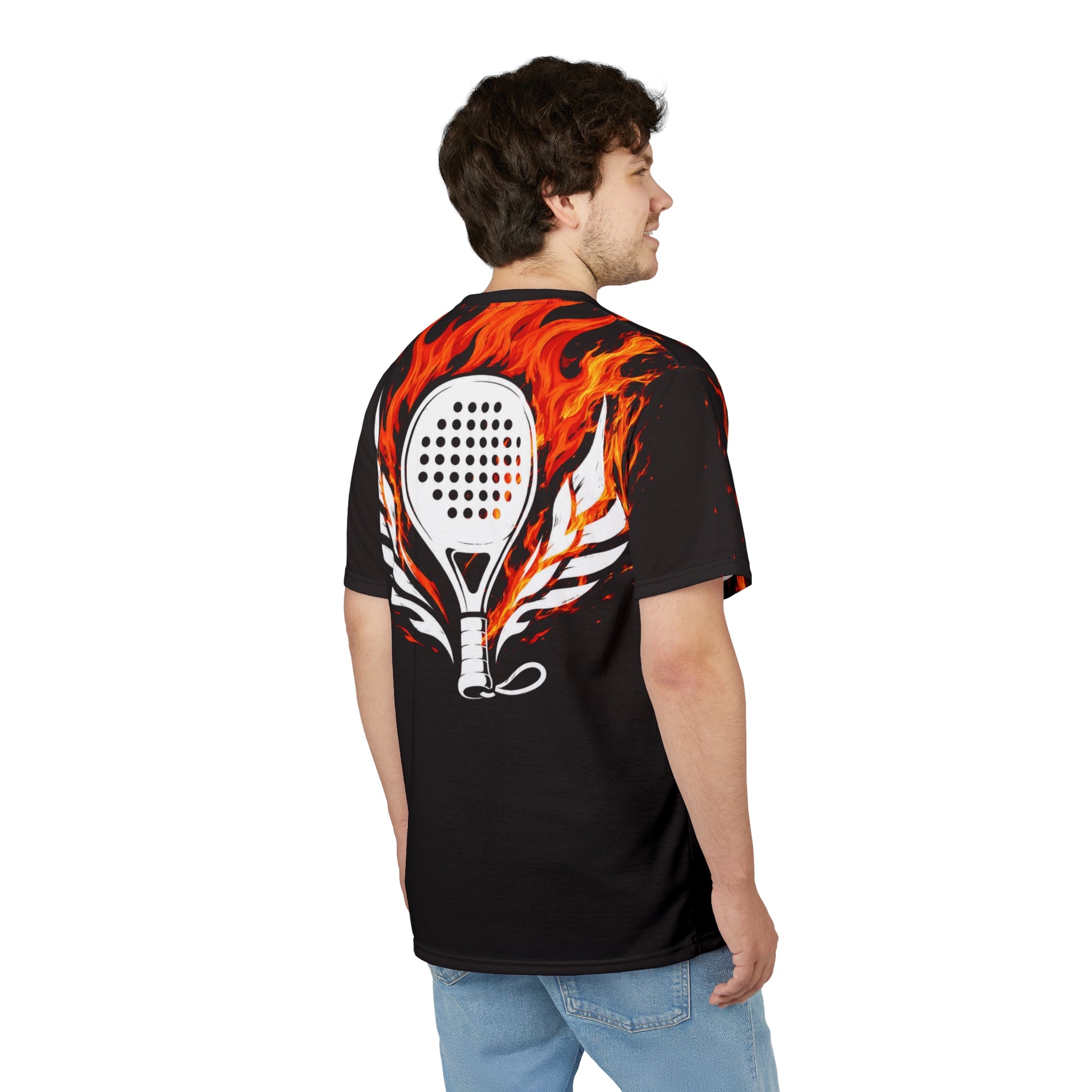 Performance Padel Shirt Man wearing a black t-shirt with a fiery paddle design on the back, standing against a white background.