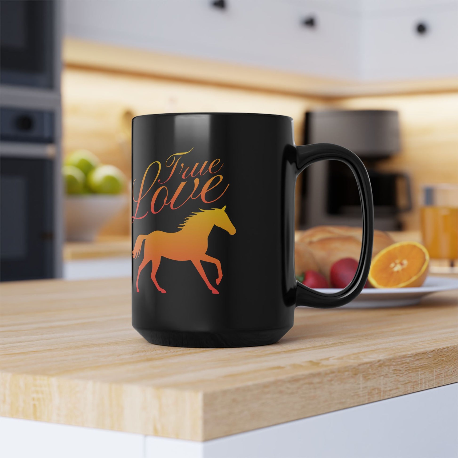 Black mug with 'True Love' and horse design on a kitchen counter