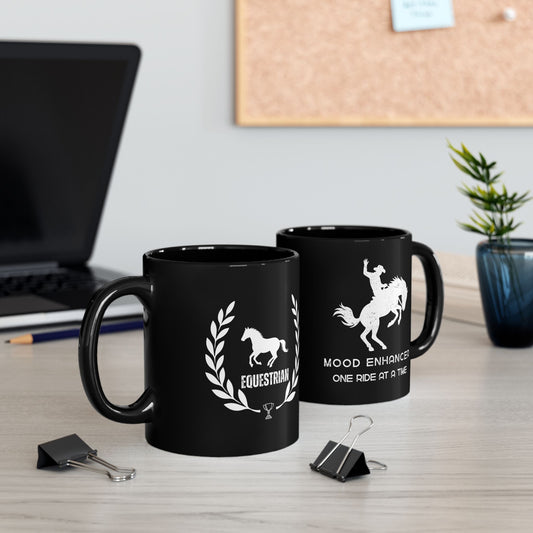 Horse Coffee Mug Two black mugs with equestrian designs on a desk with office supplies.