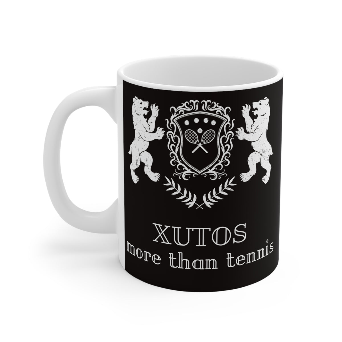 A white ceramic mug with a black printed wrap design featuring two white bears, a tennis-themed crest, and the text 'XUTOS more than tennis' on a clean white background.