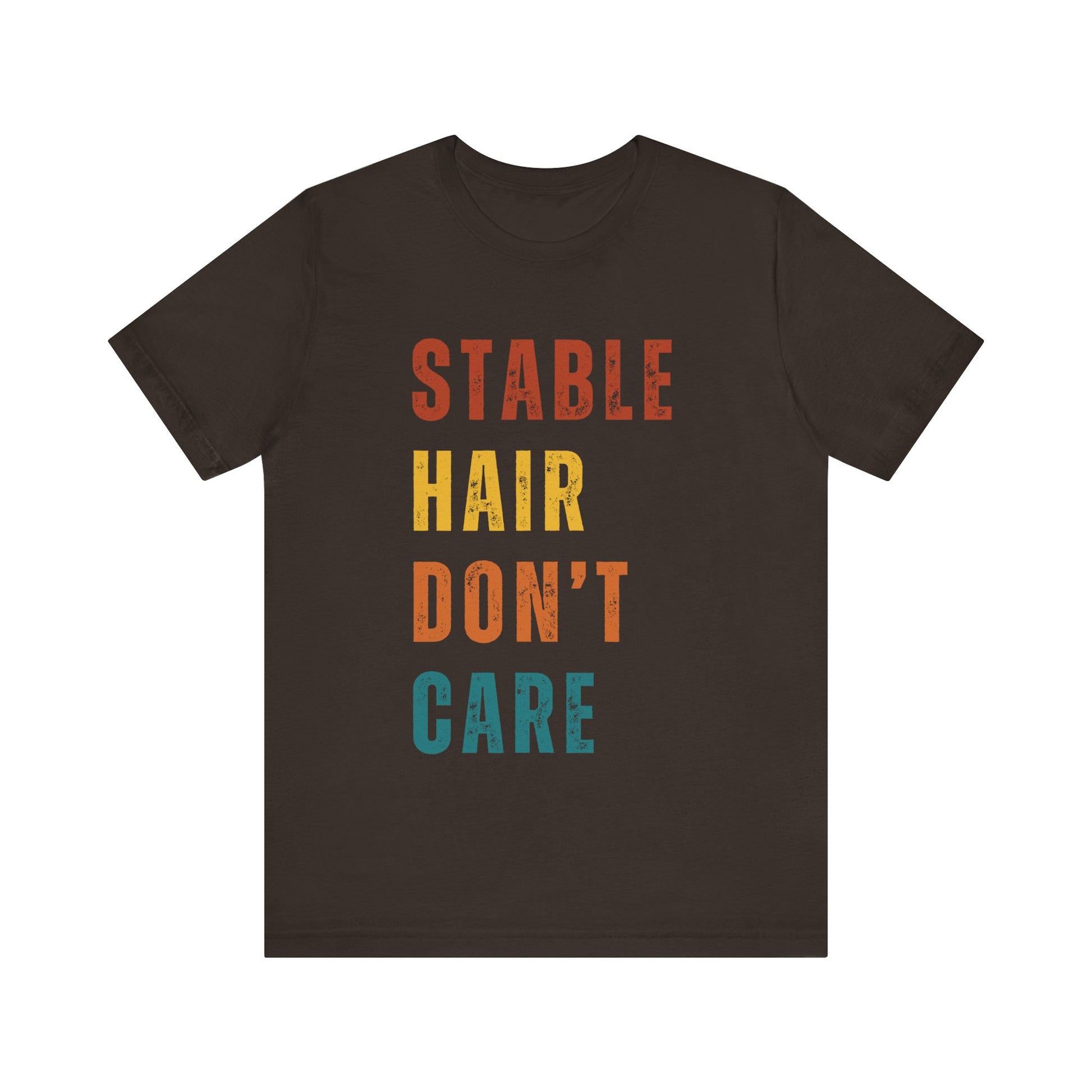 Brown t-shirt with colorful text 'STABLE HAIR DON'T CARE' on a white background