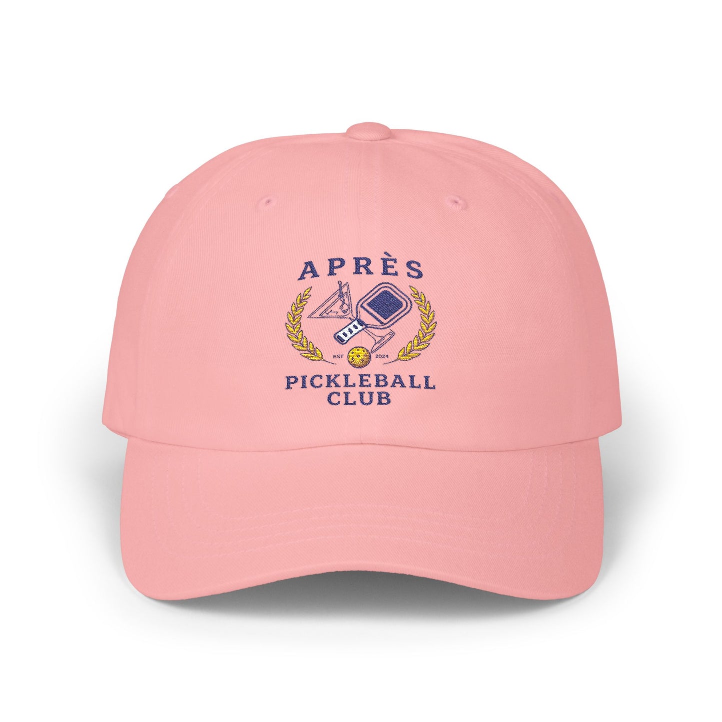 Pink cap with 'Apres Pickleball Club' logo on a white background