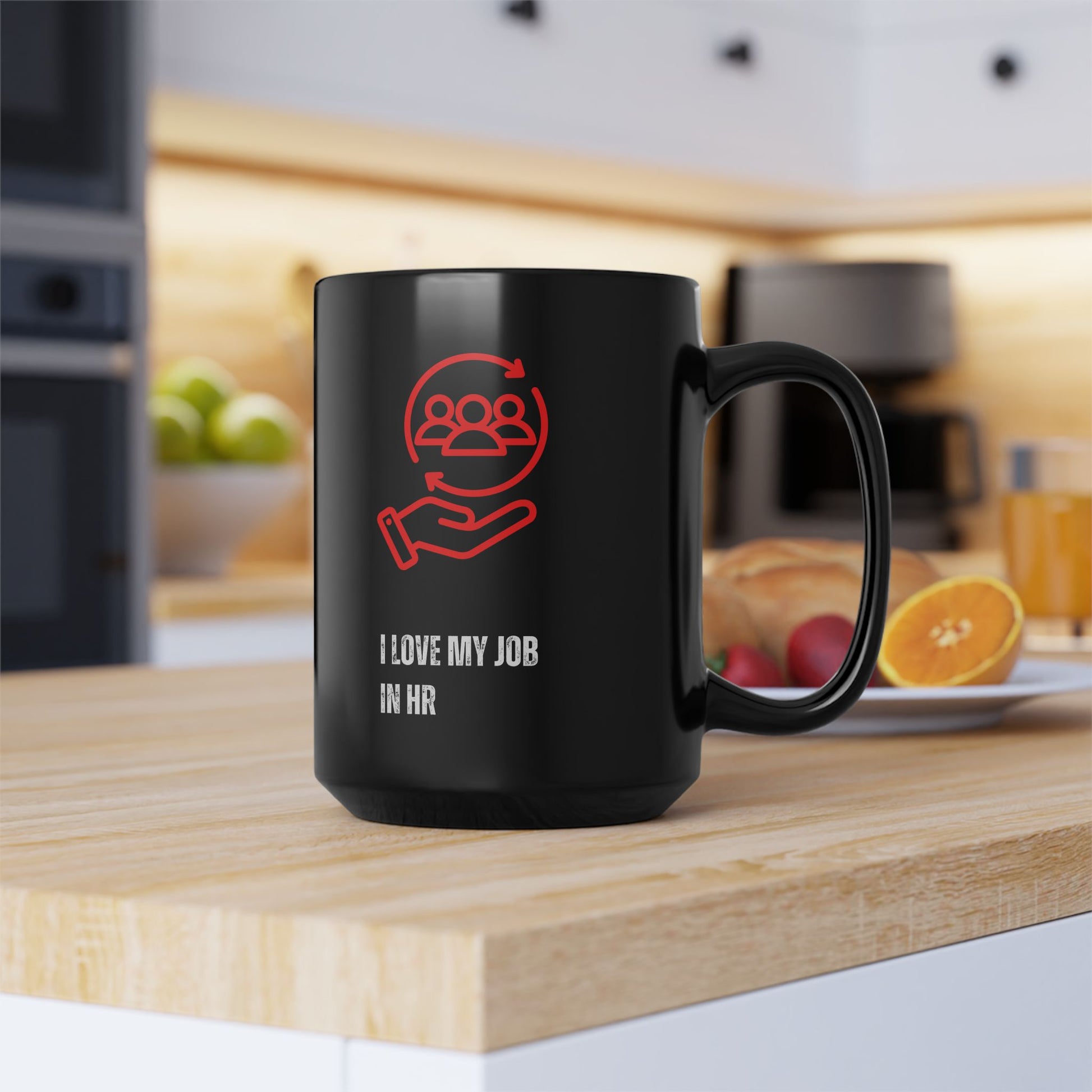 HR Coffee Mug Black mug with red and white design on a kitchen counter