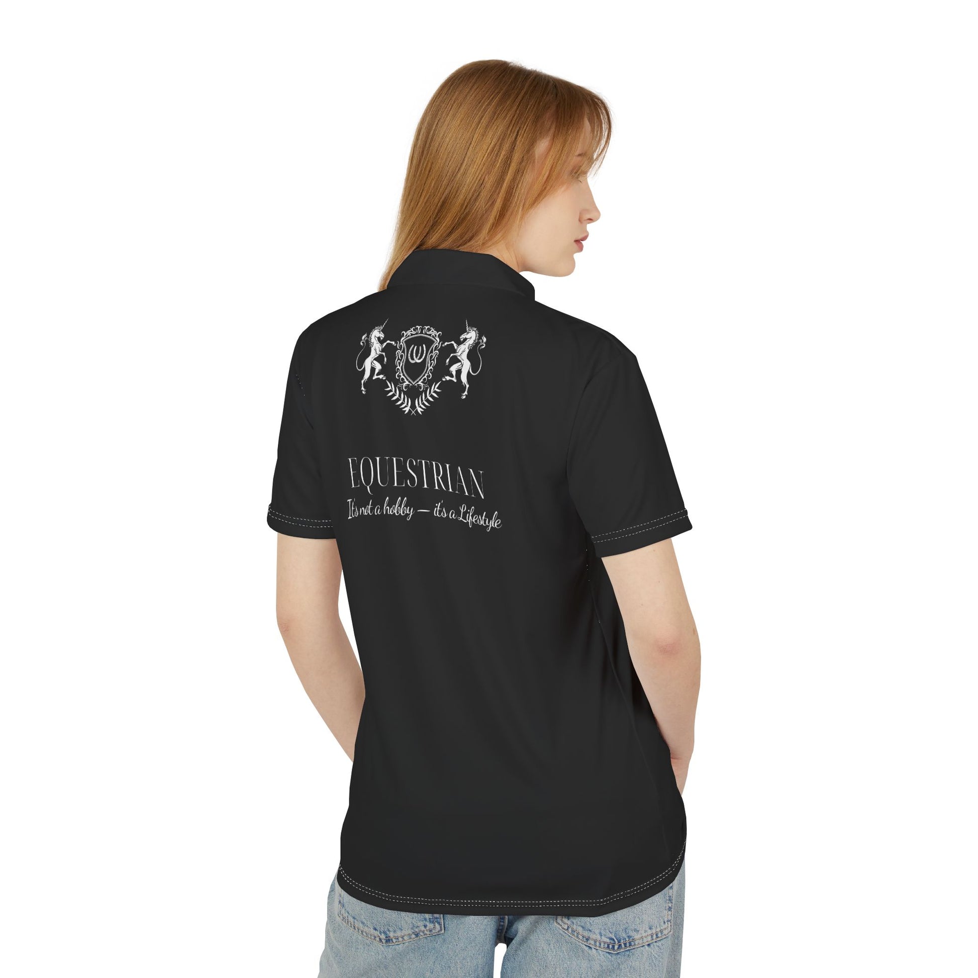 Black equestrian polo shirt with branding on the back, worn by a person.